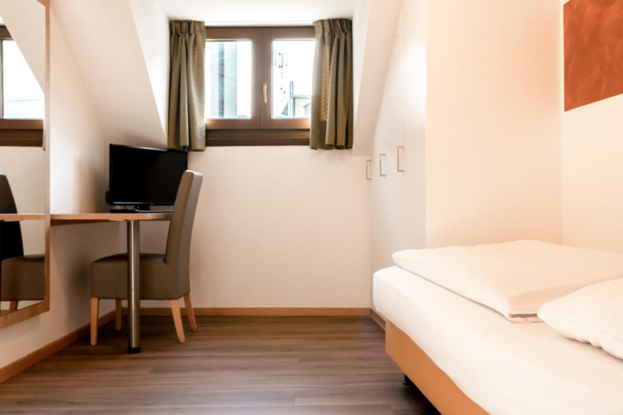 Feichter Hotel & Bistro Болзано Стая снимка